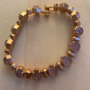 Kendra Scott rose gold and blush quartz stone bracelet.